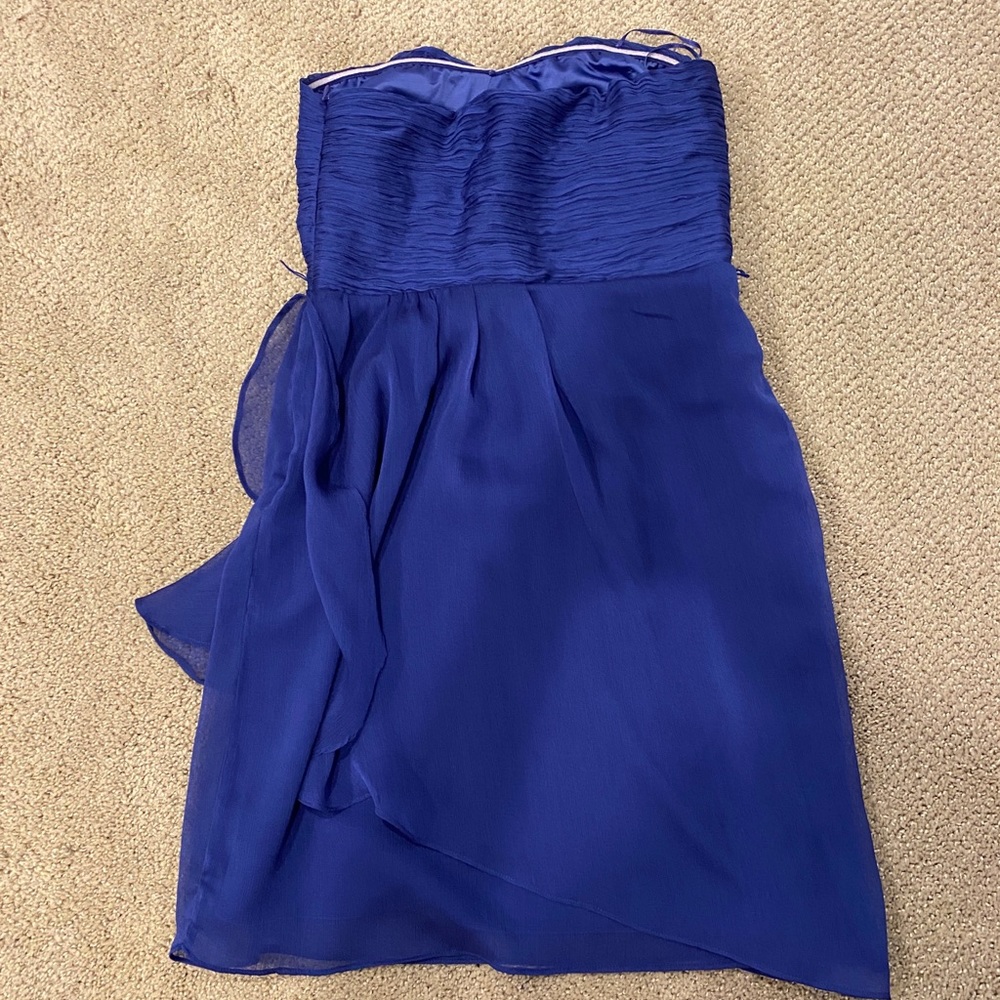 A strapless indigo Greylin dress